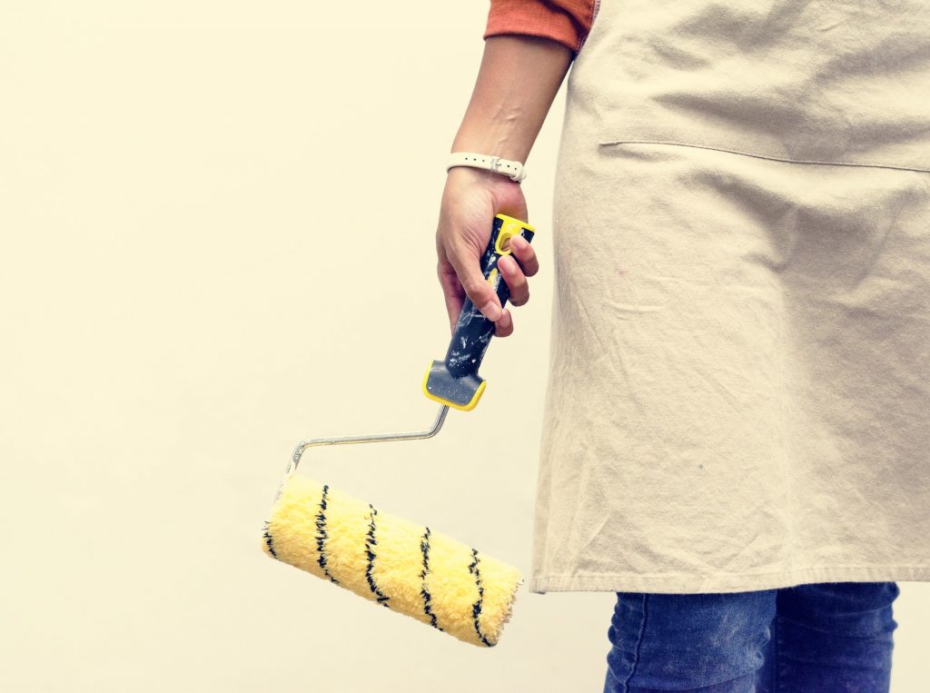 Paint holding a new paint roller